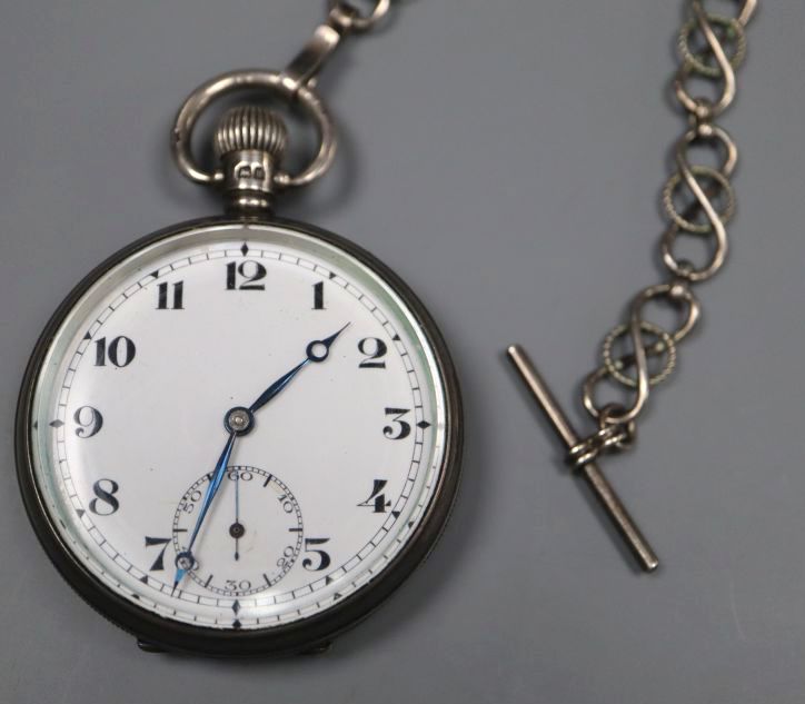 A 1920s silver open face Record keyless lever pocket watch, with a white metal albert, case diameter 48mm.